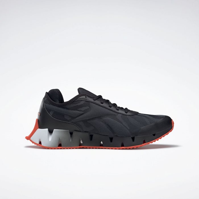 נעלי ריצה לבוגרים 100540 REEBOK ZIG DYNAMICA בצבע שחור/לבן